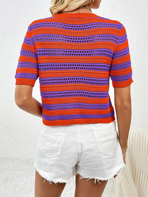 Open-knit striped crew neck top in orange and purple with short sleeves.