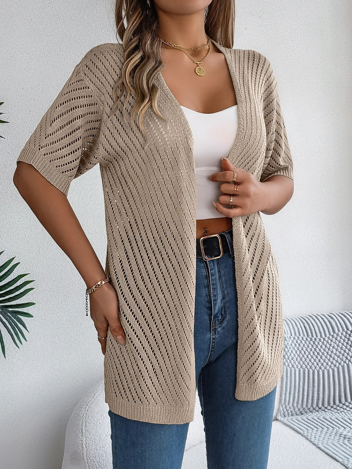 Khaki open-knit slouchy cardigan with short sleeves and a relaxed fit.