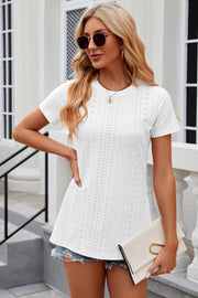 White crewneck top with eyelet perforations and side slits.