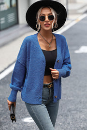 Blue textured bouclé button-down cardigan with v-neck and long sleeves