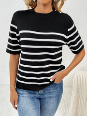 Black and white striped knit top with button shoulder detail and short sleeves.