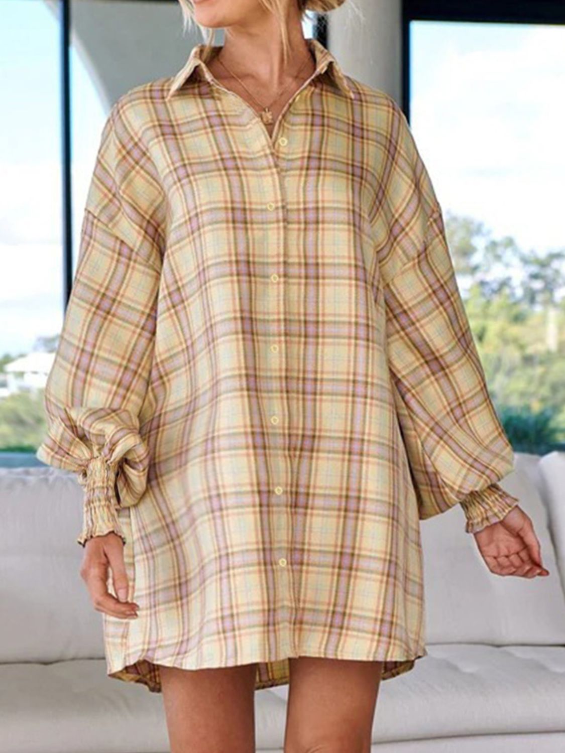 Pastel yellow plaid shirting dress with balloon sleeves and ribbed cuffs.