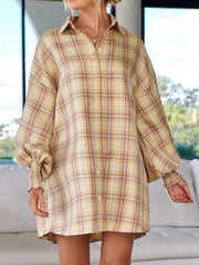 Pastel yellow plaid shirting dress with balloon sleeves and ribbed cuffs.