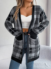 Plaid knit longline cardigan in black and grey with pockets and a cascade front.