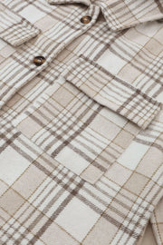 Oversized plaid shacket with attached hoodie in beige and brown plaid, featuring button-flap chest pockets.