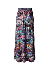 Maxi skirt with multicolor geometric print and ruffled elastic waist.
