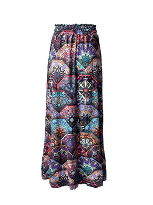 Maxi skirt with multicolor geometric print and ruffled elastic waist.