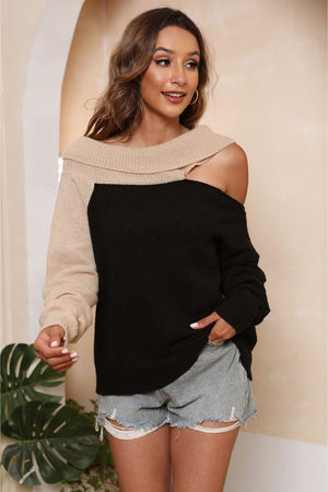 Asymmetric shoulder block sweater in black and beige acrylic with boat neck.