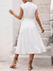 White cap sleeve midi dress with tie waist and button detail, a-line cut.