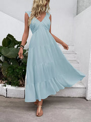 Light blue tiered maxi dress with flutter sleeves and V-neck.