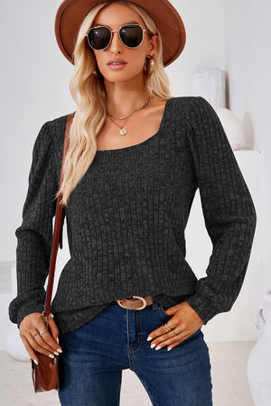 Black ribbed square neck top with puffed sleeves and long sleeves.