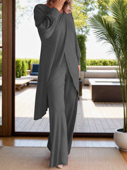 Dark gray draped overlay palazzo co-ord set with wide leg pants and long sleeves.