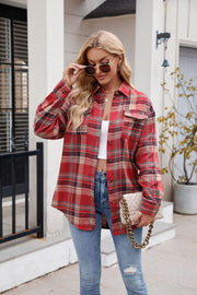 Red plaid overshirt with patch pockets and button front, styled with a white crop top and jeans.