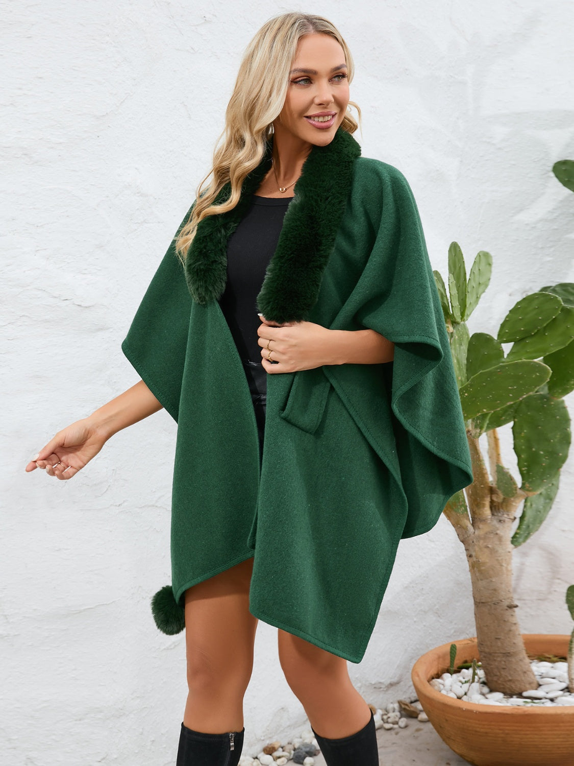 Dark green faux fur collar wrap poncho with tie detail and pom-pom accent.