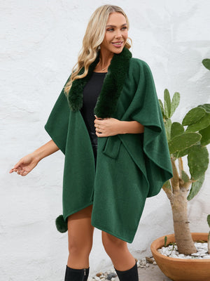 Dark green faux fur collar wrap poncho with tie detail and pom-pom accent.