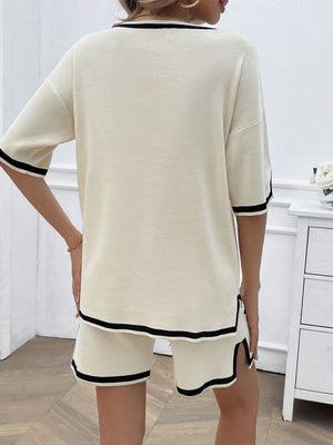 Cream knit loungewear set with black contrast trim on neckline, sleeves, and shorts.