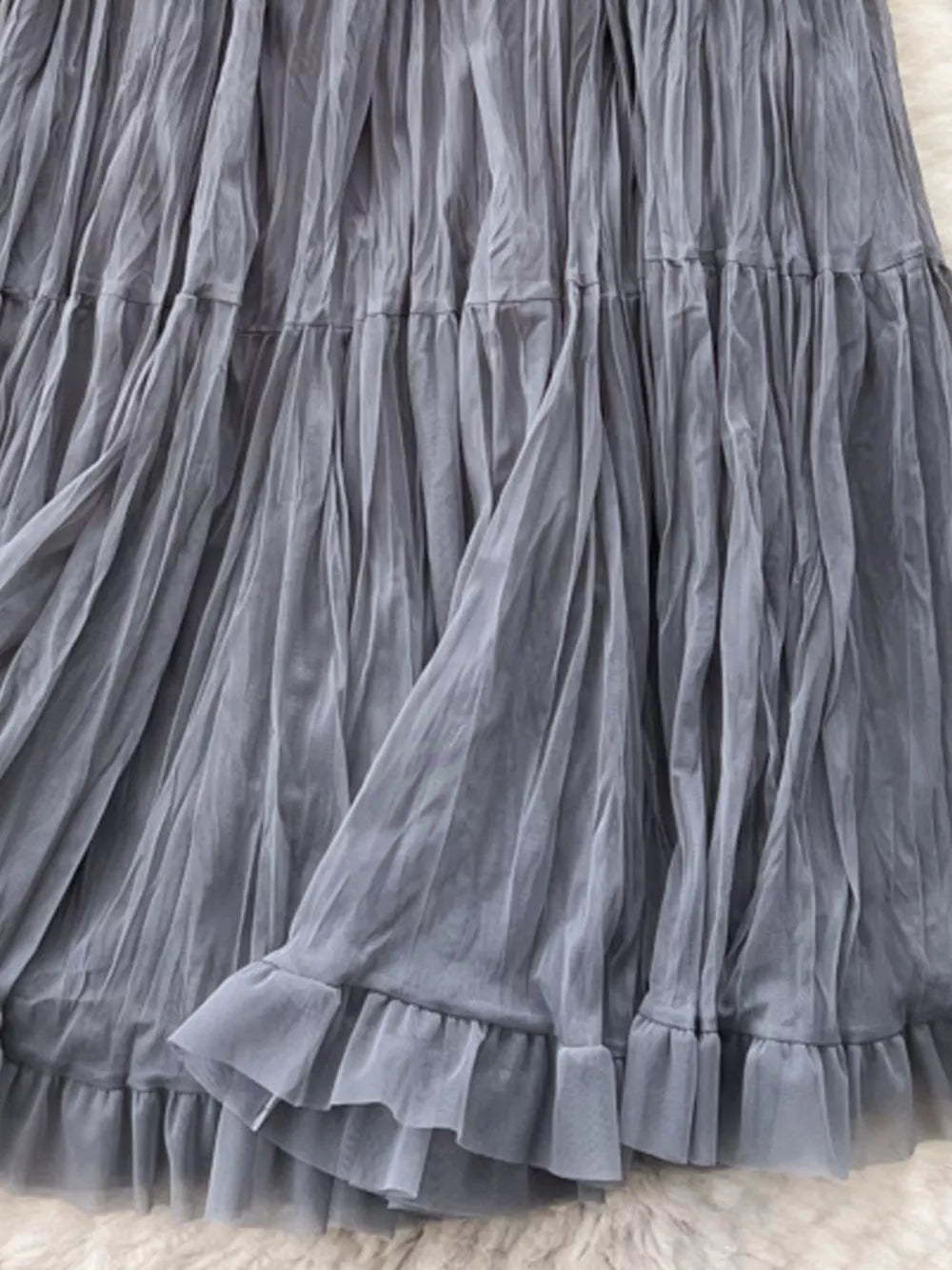 Gray tiered tulle skirt with ruffled hem and lining