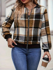 Plaid bomber jacket in caramel with ribbed cuffs and zipper closure.