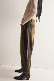 Barrel leg jeans in Olive Brown denim with a relaxed fit and visible stitching details.