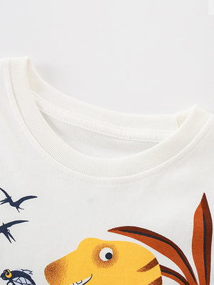 White cotton toddler t-shirt with a dinosaur and flying creatures graphic print