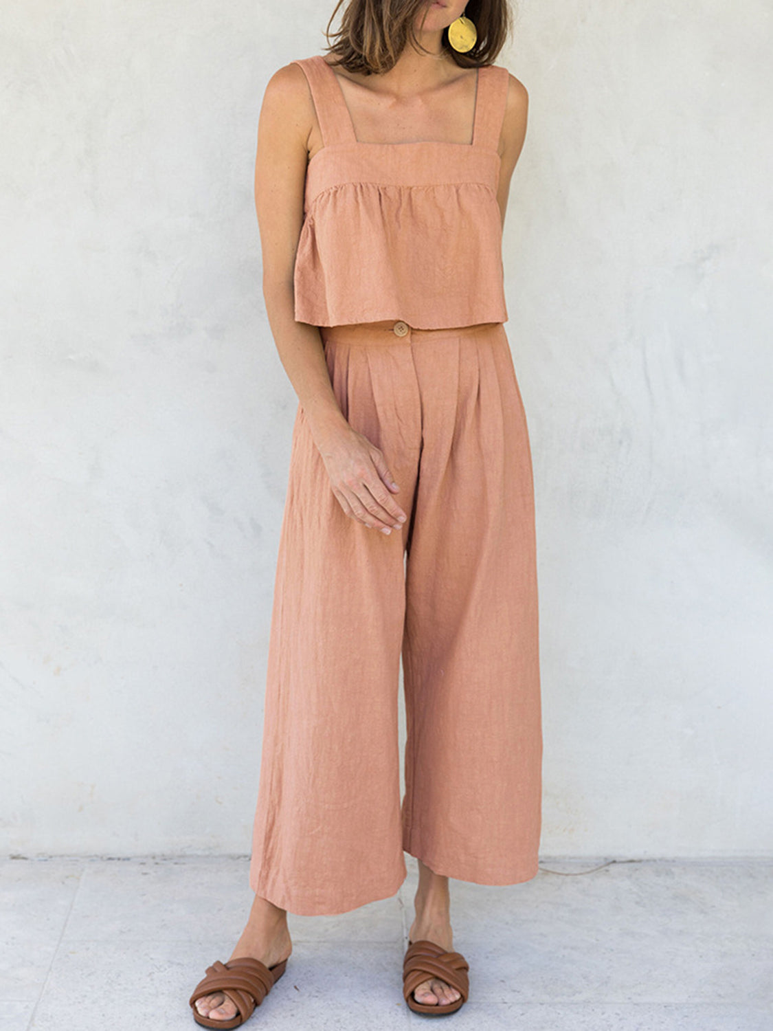 Linen crop top and culotte co-ord set in watermelon pink, with square neckline and button detail.