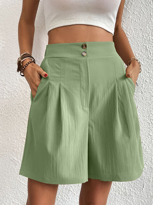 Light Green Pleated Front Bermuda Shorts with two button closure and side pockets.