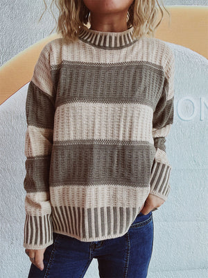Textured stripe mock neck knit sweater in caramel and olive acrylic with a waffle knit detail.