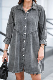 Gray denim shirtdress with ruffled cuffs and button front, A-line cut.
