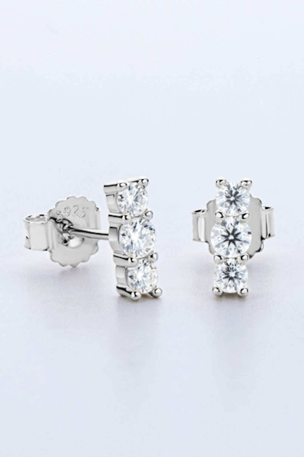 Silver triple stone bar stud earrings with clear cubic zirconia stones