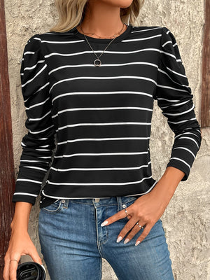 Black and white striped long sleeve top with gathered puff sleeves and crew neck