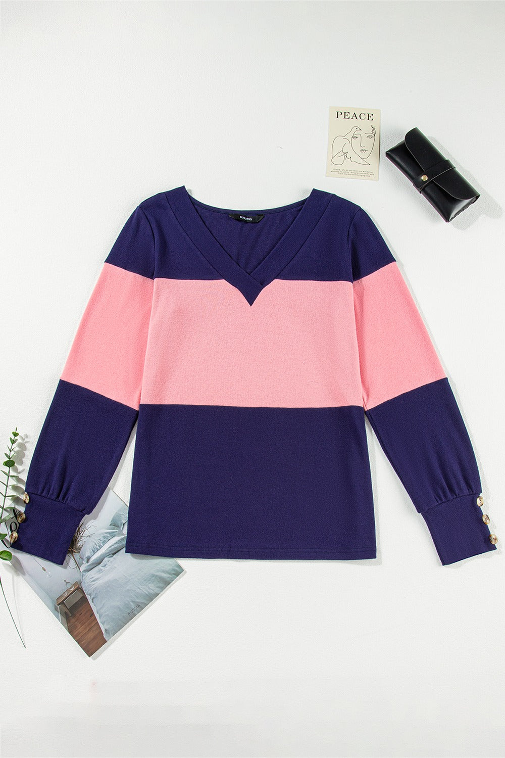 Contrast panel v-neck sweater in navy and blush pink with button cuff detail