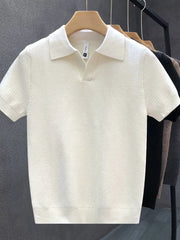 White textured knit polo shirt for men with short sleeves and a classic collar.