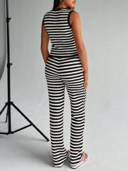 Black and white striped knit two-piece set with sleeveless top and wide-leg pants.