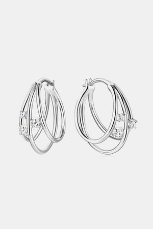Silver hoop earrings with multiple strands and cubic zirconia accents.