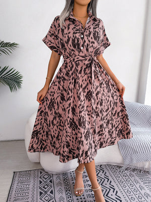 Dalmatian print midi shirt dress in dusty pink with short sleeves and a tie waist.