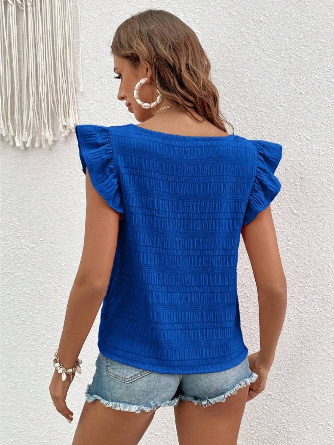 Royal blue textured ruffle sleeve square neck blouse with smocked detail