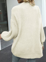 Chunky knit cocoon cardigan in tan with balloon sleeves and a relaxed fit.