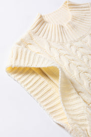 Ivory cable knit mock neck vest with ribbed trim and detailed stitching.