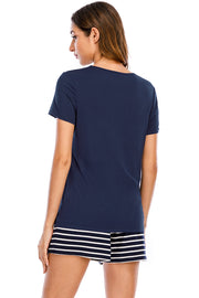 Dark blue graphic tee and striped shorts pajama set