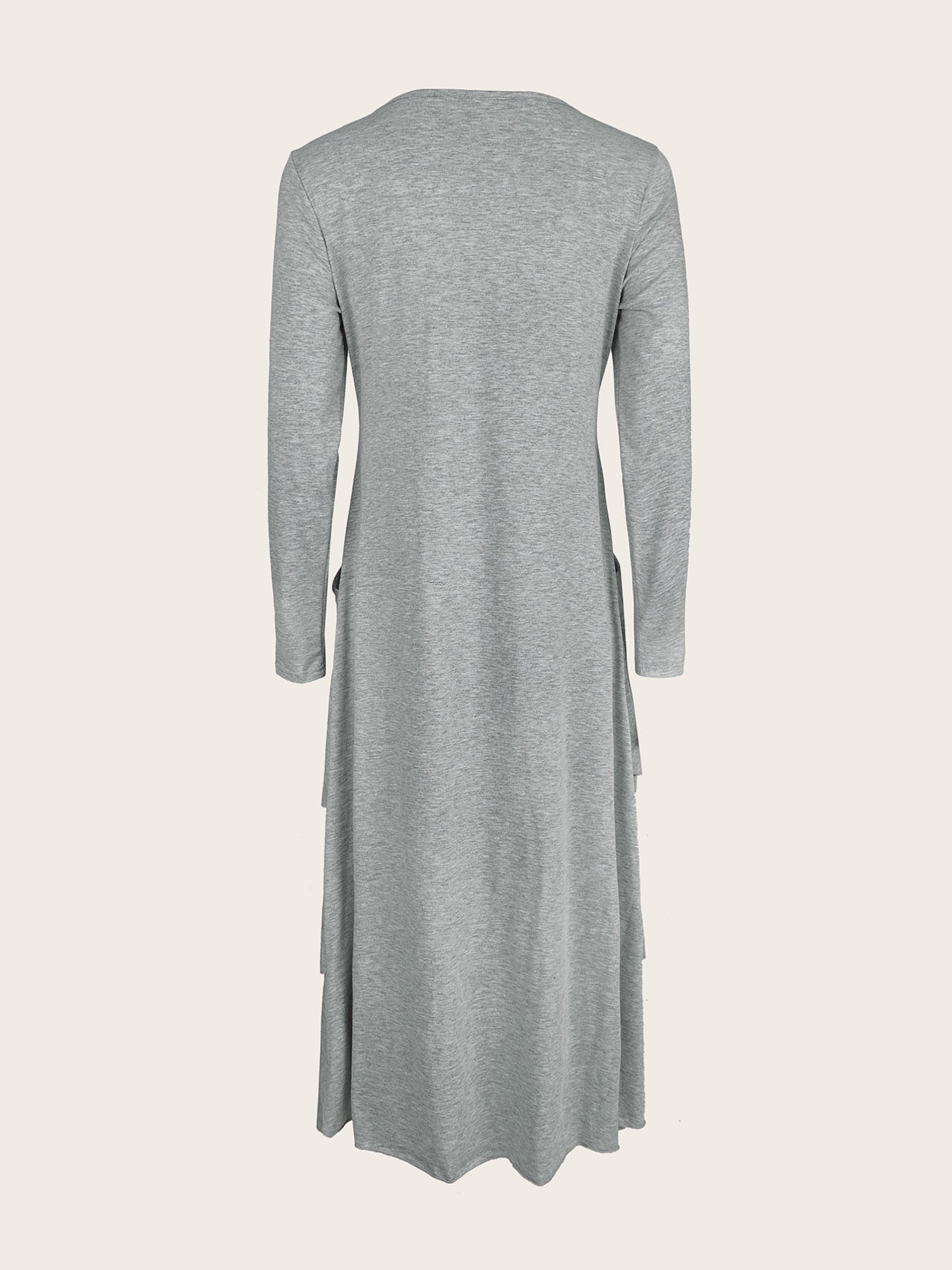 Light gray long sleeve midi dress with asymmetrical tiered hem and pockets.
