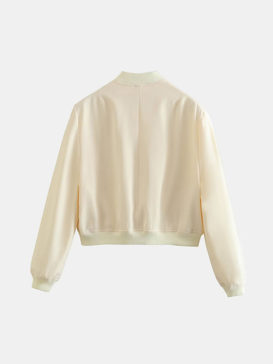 Cream utility bomber jacket with ribbed collar, cuffs, and hem.