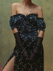 Floral off-shoulder dress with puff sleeves and a high slit, in navy with a cream floral print.