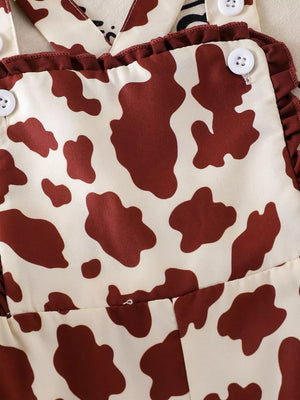 Children's Cow Print Ruffle Jumpsuit in Brown And White, editorial view