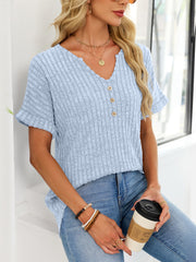 Light blue ribbed knit short sleeve t-shirt with decorative buttons and a curved hem.