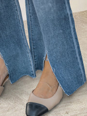Medium wash cotton flare jeans with split hem detail