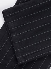 Black striped sweatpants with a wide-leg cut.