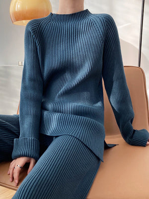 French Blue ribbed knit co-ord set with asymmetric hem and cuffed sleeves.