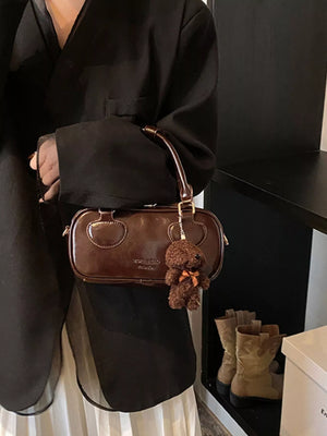 Chic mini PU leather crossbody bag in chocolate brown with teddy bear charm