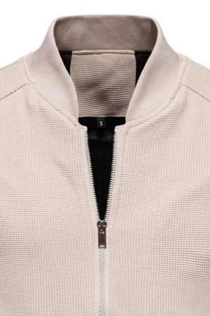 Textured knit bomber jacket in Taupe with faux shearling collar detail and silver zipper.