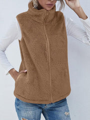 Teddy fleece stand-collar vest in camel with zip front and pockets.